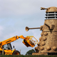 Image for article titled 35-foot-tall straw Dalek terrorizes British countryside